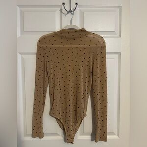 Sheer Tan Long Sleeve Bodysuit with Black Stars